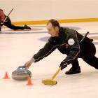 Australian curlers Laurie Weeden (left) and Ian Palangio practise at the Dunedin Ice Stadium this...
