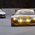Australian GT cars negotiate the fast and tricky Southern Loop during running of the Highlands...