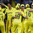 Australian players celebrate their win over India in Sydney. REUTERS/David Gray