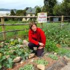 Author and gardening enthusiast Diana Noonan in her Papatowai road-side garden plot, which offers...