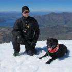 Avalanche search dog Milly, with handler Brendan Kearns, enjoys her last day on the job yesterday...