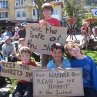 Backing the lobby to keep The Hobbit in New Zealand yesterday at Queenstown's village green are...