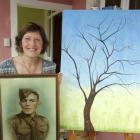 Balclutha artist Sue McPhee with a photograph of Private James Landreth, her husband's uncle and...