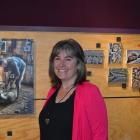 Balclutha photographer Joanne McLeary with some her photos exhibited in the community gallery at...