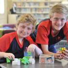 Balmacewen Intermediate pupils (from left) Sam Thompson and George Bates  use puzzles to develop...