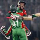 Bangladesh captain Mushfiqur Rahim celebrates with Abdur Razzak (41) after they defeated West...