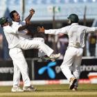 Bangladesh players, from left, Shahriar Nafees, Elias Sunny and Raqibul Hasan celebrate the...