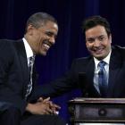 Barack Obama smiles next to Jimmy Fallon at an interview during a televised taping of the "Late...