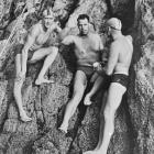 Barrie Devenport (waving), the first person to swim Cook Strait, with final pacers Ian Greenwood ...