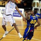 Wellington Saints Ernest Scott climbs above the Otago Nuggets centre Antoine Tisby to score at...