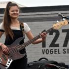 Bassist Mia Knott (16), from St Hilda's Collegiate School band Like a Kid, performs at the Vogel...