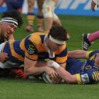 Bay of Plenty's Culum Retallick crashes over to score against Otago. Photo Gregor Richardson
