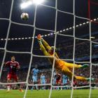 Bayern Munich's Jerome Boateng (not pictured) scores a goal past Manchester City goalkeeper Joe...