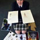 Bayfield High School pupil Emma Rogers-Bromley (16) shows photographs and sketches of her  ...