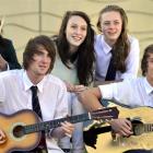 Bayfield High School rock band members (from left) Win Piyaoui, Blake Lewis, Sam Shannon, Grace...