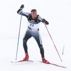 Ben Koons, of New Zealand, competes in the men's 10km cross-country skiing at the Snow Farm near...