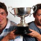 Ben (left) and Jake Hawker with the New Zealand Sunburst yachting trophy they won on  Otago...