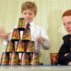 Ben Lovelock (17) watches fellow New Zealand Black Stacks team member William McLauchlan (11)...