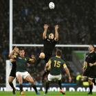 Ben Smith jumps to take a high ball for the All Blacks against the Springboks during their...