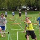 Ben Wilkinson leads Cameron Moran (left) and Kayde Hollebon (all 9) in their event.