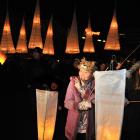 Bethany Parker-Farmer (10) and Sophie Keen (13) take part in the lantern parade during Dunedin's...