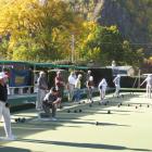 Between their moments of intense concentration, the players at the bowling tournament enjoyed the...