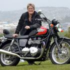 Dunedin City Council chief executive Dr Sue Bidrose stands with her retro-styled 2009 Triumph...