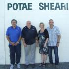 Bill Potae (left), Jim Murdoch and Shara and Jason Davis reflect on the sale of Potae Shearing....