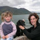 Billie the huntaway-spaniel cross (14) returned yesterday to the scene of her near drowning at...