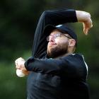 Black Caps all-rounder Daniel Vettori rolls his arm over during team training at the University...
