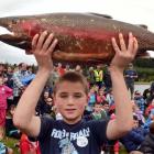 Blake Rackham, of Dunedin, shows off his 5kg rainbow trout caught yesterday in the Southern...