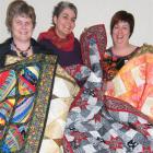 Blue Willow Quilters group members Wendy Culbertson (left) and Yvonne Reid (centre) and Resthaven...