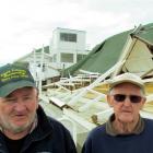 Bob Goodeve (left) and retired trainer Dick Langford stand in front of the remains of the public...
