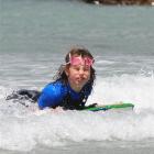 Boogie boarding close to shore at Brighton beach yesterday is Rebekah Pitcaithly (12). Photo by...