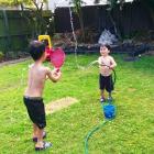 Boys having fun with water today. Photo Dianne McDonald