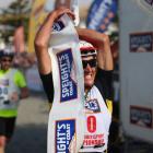 Braden Currie celebrates winning the one-day individual event of the 2013 Speights Coast to Coast...
