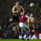 Bradford City's James Hanson (L) jumps above Aston Villa's Ciaran Clark during their English...