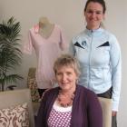 Breast cancer survivor Jo Grimmer, seated, with The Studio Pink Pilates Trust pilates instructor...