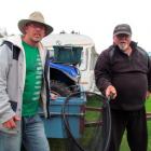 Brent Godfery, from Oamaru, left, and Jim O'Connor, from Christchurch, pack up after spending the...