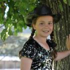 Brianna Hedley prepares to perform before an audience at the Silverpeaks Country Music Club...