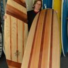 Brighton surfing enthusiast Rob Willers displays some of his wooden surfboards. Photo by Sally Rae.