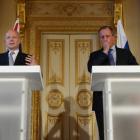 Britain's Foreign Secretary William Hague (L) and Russia's Foreign Minister Sergei Lavrov hold a...