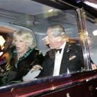 Britain's Prince Charles and Camilla, Duchess of Cornwall, react as their car is attacked by...