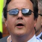 British Prime Minister David Cameron, seen watching England play India in the fourth cricket test...