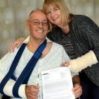 British tourist Paul Whitmell (57), holding a letter from the Chinese woman who crashed into him...