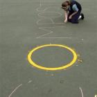 Brittany Kingsland (14) raises awareness of the benefits of composting during an EnviroSchools...