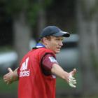 Highlanders first five-eighth Tony Brown corrals the troops during training at Logan Park...