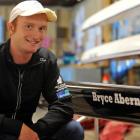 Bryce Abernethy with the boat named after him at the Otago Rowing Club yesterday. Photo by Gregor...