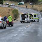 Emergency services attend the crash. Photo by Jane Dawber