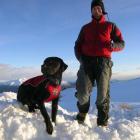 Callum Grant, of the Treble Cone ski patrol, with trainee search dog Zeppelin (18 months). Photo...